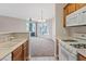 Open concept living room with a ceiling fan and natural light at 7119 S Durango Dr # 211, Las Vegas, NV 89113