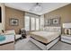 Cozy bedroom with neutral walls, modern lighting, and a comfortable bed, creating a serene atmosphere at 7208 Grace Estate Ave, Las Vegas, NV 89113