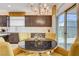 Elegant dining area with a modern table and ample natural light, perfect for Gathering meals at 7208 Grace Estate Ave, Las Vegas, NV 89113
