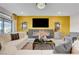 Comfortable living room with a modern fireplace, sleek decor, and an open, inviting atmosphere at 7208 Grace Estate Ave, Las Vegas, NV 89113