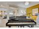 Living area with a piano and an open floor plan at 7208 Grace Estate Ave, Las Vegas, NV 89113