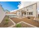 Beautiful backyard featuring a pool, outdoor kitchen, and covered patio at 7466 Matilda St, Las Vegas, NV 89113