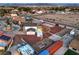 Bird's-eye view showcasing the property's location, backyard space, and layout in relation to surrounding houses at 7477 Ullom Dr, Las Vegas, NV 89139