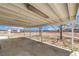 Spacious covered back patio area and large backyard offers opportunity for relaxation and recreation at 7477 Ullom Dr, Las Vegas, NV 89139