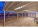 Covered patio with a concrete floor, wooden beams, and supports at 7477 Ullom Dr, Las Vegas, NV 89139