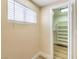 This walk-in closet features built-in shelves and drawers for optimal organization at 7477 Ullom Dr, Las Vegas, NV 89139