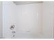 Shower stall showing the white tile and the shower head at 7857 Midnight Ride St, Las Vegas, NV 89131