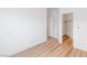 Bedroom with wood-style floors and a walk-in closet at 7936 Pinnochio Ave, Las Vegas, NV 89131