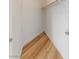 Walk-in closet featuring wood-style floors and a hanging rod at 7936 Pinnochio Ave, Las Vegas, NV 89131