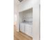 Functional laundry room featuring a washer and dryer with ample storage space at 7936 Pinnochio Ave, Las Vegas, NV 89131