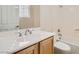 Bathroom with a single sink vanity, white countertop, toilet, and shower/bathtub combination at 8305 Chapelle Ct, Las Vegas, NV 89131