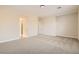 Bright, carpeted room featuring a doorway, closet, and large space at 8305 Chapelle Ct, Las Vegas, NV 89131