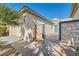 Gated courtyard entrance with stone accents, adding privacy and curb appeal to the home's exterior at 8305 Chapelle Ct, Las Vegas, NV 89131