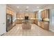 Spacious kitchen with stainless steel appliances, a large island, and ample cabinet space at 8305 Chapelle Ct, Las Vegas, NV 89131