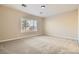 Inviting living room with a large window, perfect for enjoying natural light and a serene view at 8305 Chapelle Ct, Las Vegas, NV 89131