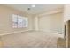 Bright living room with a large window providing natural light and a glimpse of the outdoors at 8305 Chapelle Ct, Las Vegas, NV 89131