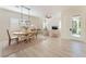 Inviting dining space with a view of the front door and ample natural light at 8504 Mystic Night Ave, Las Vegas, NV 89143