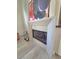 Close up of the stone fireplace, adding a touch of elegance to the home's interior at 8504 Mystic Night Ave, Las Vegas, NV 89143