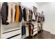 Organized walk-in closet with ample hanging space, built-in shelving, and drawer storage at 8504 Mystic Night Ave, Las Vegas, NV 89143