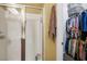 Bathroom featuring a glass-enclosed shower, well-organized closet and neutral-toned walls at 8873 Briar Bay Dr, Las Vegas, NV 89131