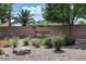View of the community entrance sign amidst desert landscaping, creating an inviting first impression at 8873 Briar Bay Dr, Las Vegas, NV 89131