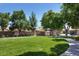 Expansive grassy park area with mature trees and a picnic area, perfect for outdoor recreation at 8873 Briar Bay Dr, Las Vegas, NV 89131