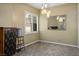 Bright dining area featuring stylish pendant lighting and a decorative mirror, perfect for gatherings at 8873 Briar Bay Dr, Las Vegas, NV 89131
