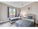 Shared bedroom with two twin beds near a window and decorated with whimsical artwork at 9328 Jumpin Juniper Ave, Las Vegas, NV 89129