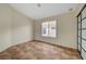 Bedroom with tile floors and sliding door closet at 9772 Galahad Point Ct, Las Vegas, NV 89147