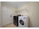 Laundry room equipped with modern washer and dryer at 9772 Galahad Point Ct, Las Vegas, NV 89147