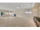 Spacious living room featuring tile flooring, fireplace and lots of natural light at 9772 Galahad Point Ct, Las Vegas, NV 89147