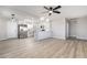 Bright, open-concept living and kitchen space with modern finishes and stainless steel appliances at 113 Elm St, Henderson, NV 89015