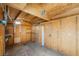 The interior of the shed features plywood walls, shelving, and outlets at 113 Elm St, Henderson, NV 89015