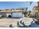 Beautiful two-story house featuring a well-maintained lawn, two-car garage, desert landscaping, and tile roof at 1352 Angel Falls St, Las Vegas, NV 89142