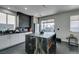 Modern kitchen featuring sleek cabinets, stainless steel appliances, and a center island with built-in wine rack at 1352 Angel Falls St, Las Vegas, NV 89142
