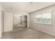 A bedroom featuring carpeted floors, a closet, and a window at 1704 Kismet Cir, Las Vegas, NV 89108
