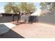 Large backyard featuring gravel, a tree, and partial shade at 1805 Amboy Dr, Las Vegas, NV 89108