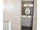 Bathroom view through doorway to vanity and mirror at 1805 Amboy Dr, Las Vegas, NV 89108