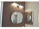 Modern bathroom featuring sleek mirrors and stylish accent lighting above the vanity at 1805 Amboy Dr, Las Vegas, NV 89108