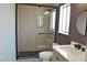Bathroom features modern fixtures, glass-enclosed shower, and stylish tile work at 1805 Amboy Dr, Las Vegas, NV 89108