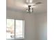 Bright bedroom with large window and modern light fixture at 1805 Amboy Dr, Las Vegas, NV 89108