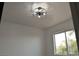 Bedroom with contemporary ceiling light fixture and window offering natural light at 1805 Amboy Dr, Las Vegas, NV 89108