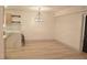 Bright open dining area with stylish light fixture and counter seating area at 1805 Amboy Dr, Las Vegas, NV 89108