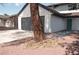 Charming two-story home featuring a spacious driveway and landscaped front yard at 1805 Amboy Dr, Las Vegas, NV 89108