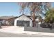 Charming two-story home with a well-maintained yard and a spacious driveway at 1805 Amboy Dr, Las Vegas, NV 89108