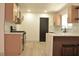 Updated kitchen featuring modern countertops, cabinetry, backsplash, and stainless steel appliances at 1805 Amboy Dr, Las Vegas, NV 89108