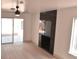 Bright living room featuring a modern fireplace, sleek floors and sliding glass doors at 1805 Amboy Dr, Las Vegas, NV 89108