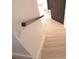 The home features modern light wood stairs and black handrail at 1805 Amboy Dr, Las Vegas, NV 89108