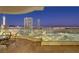Balcony with sweeping city views and dining furniture at 2777 Paradise Rd # 2001, Las Vegas, NV 89109