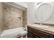 Bathroom featuring shower-tub combo and single sink vanity at 2898 Violet Ln # 0, Henderson, NV 89074